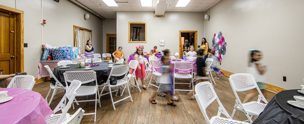 Child's tea party in the Peanut Museum Conference Room